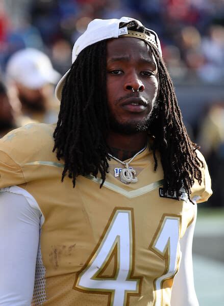 what does alvin kamara's necklace say|alvin kamara facts.